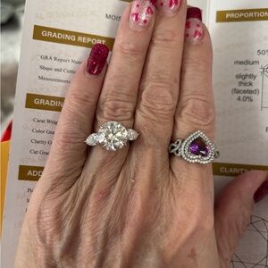 6 carat Moissanite VVS1 D color. This is a gorgeous WOW ring. .925 sterling